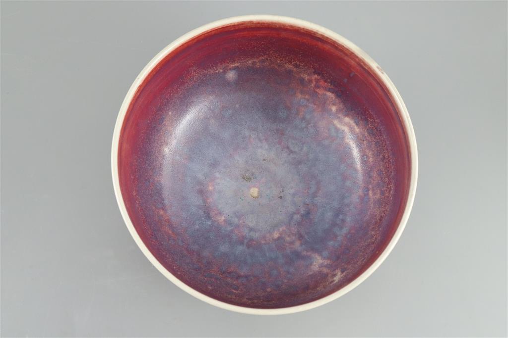 A Ruskin high fired flambe footed bowl, dated 1924, 22cm diameter